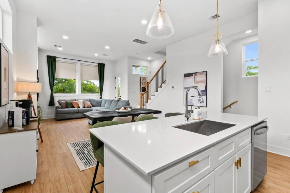 Rachel: Kitchen island and living room